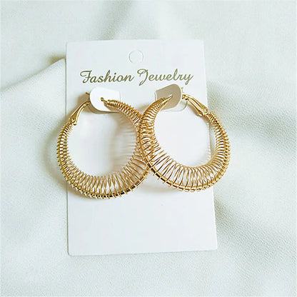 Trendy Spring Curve Earrings in Gold and Silver