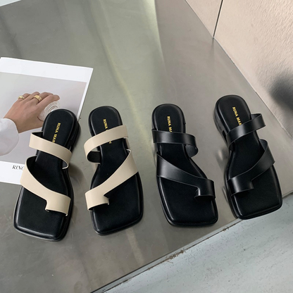 High-Heeled Black Leather Sandals with Asymmetric Belt