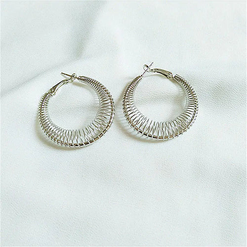 Trendy Spring Curve Earrings in Gold and Silver