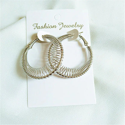 Trendy Spring Curve Earrings in Gold and Silver